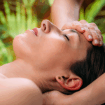 relaxed feminine person receiving a professional massage therapy session at Elysium Massage in Yellow Springs, Ohio, promoting relaxation, stress relief, and overall wellness